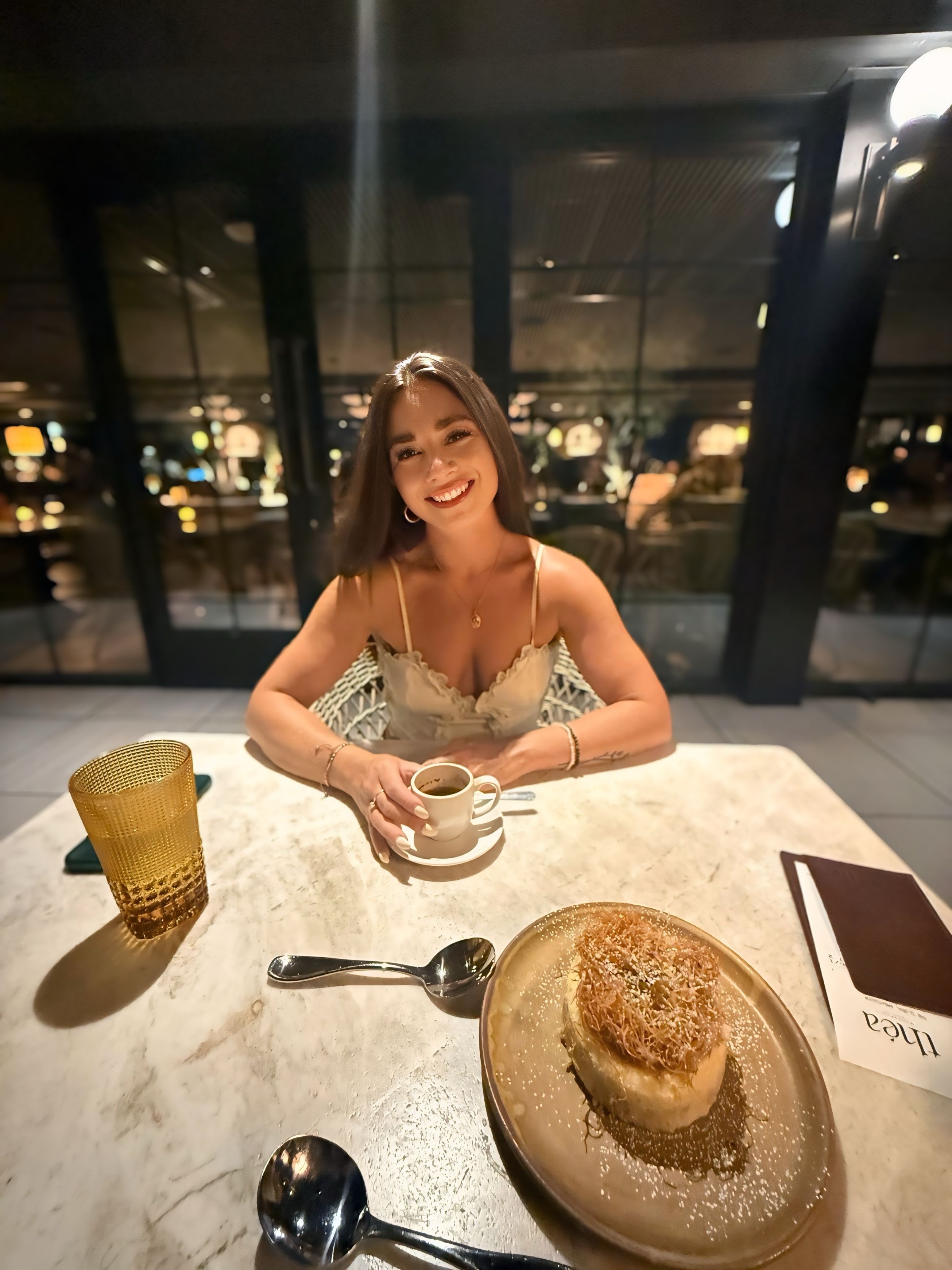 Client enjoying dessert and espresso out